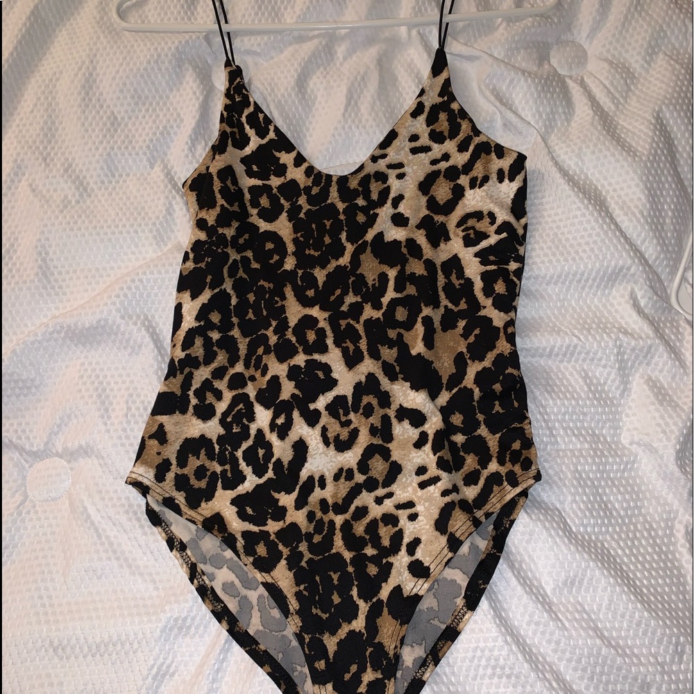 Thin strapped cheetah print body suit